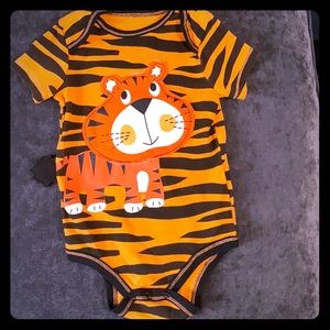 Adorable baby boy lion onesie.